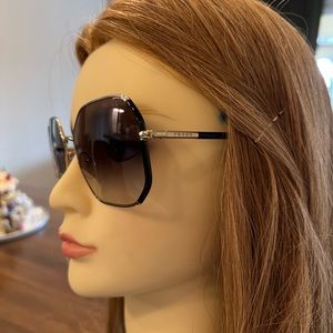 Authentic Prada with gradient lens.